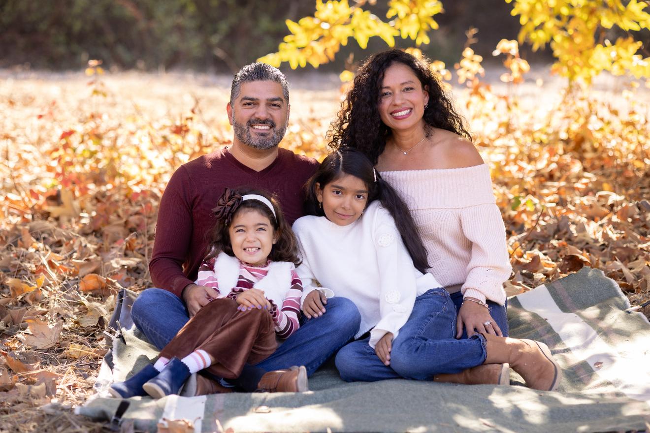Omar Michel outdoors in San Diego with members of his family
